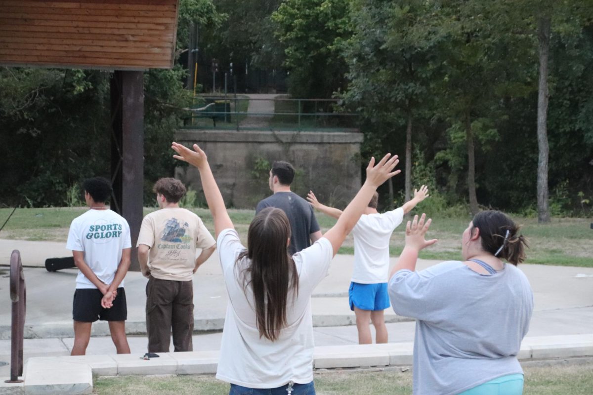 Student worship at Railyard Park during For the Lost Jesus Club's Revival Night on Sept. 16. 