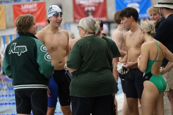 Waxahachie swimmers at a meet in Mansfield on Oct. 8, 2024. 