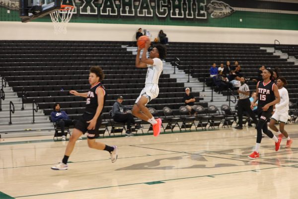 Mike Gatewood goes in for a dunk.